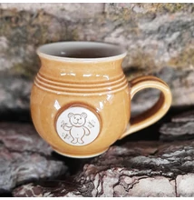 Sárga macis bögre - kicsi, emblémás