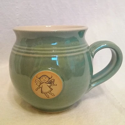 Almazöld tündéres bögre - emblémás